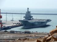 Министерство обороны КНР опубликовало новую фотографию авианосца "Ляонин", пришвартовавшегося в военном порту